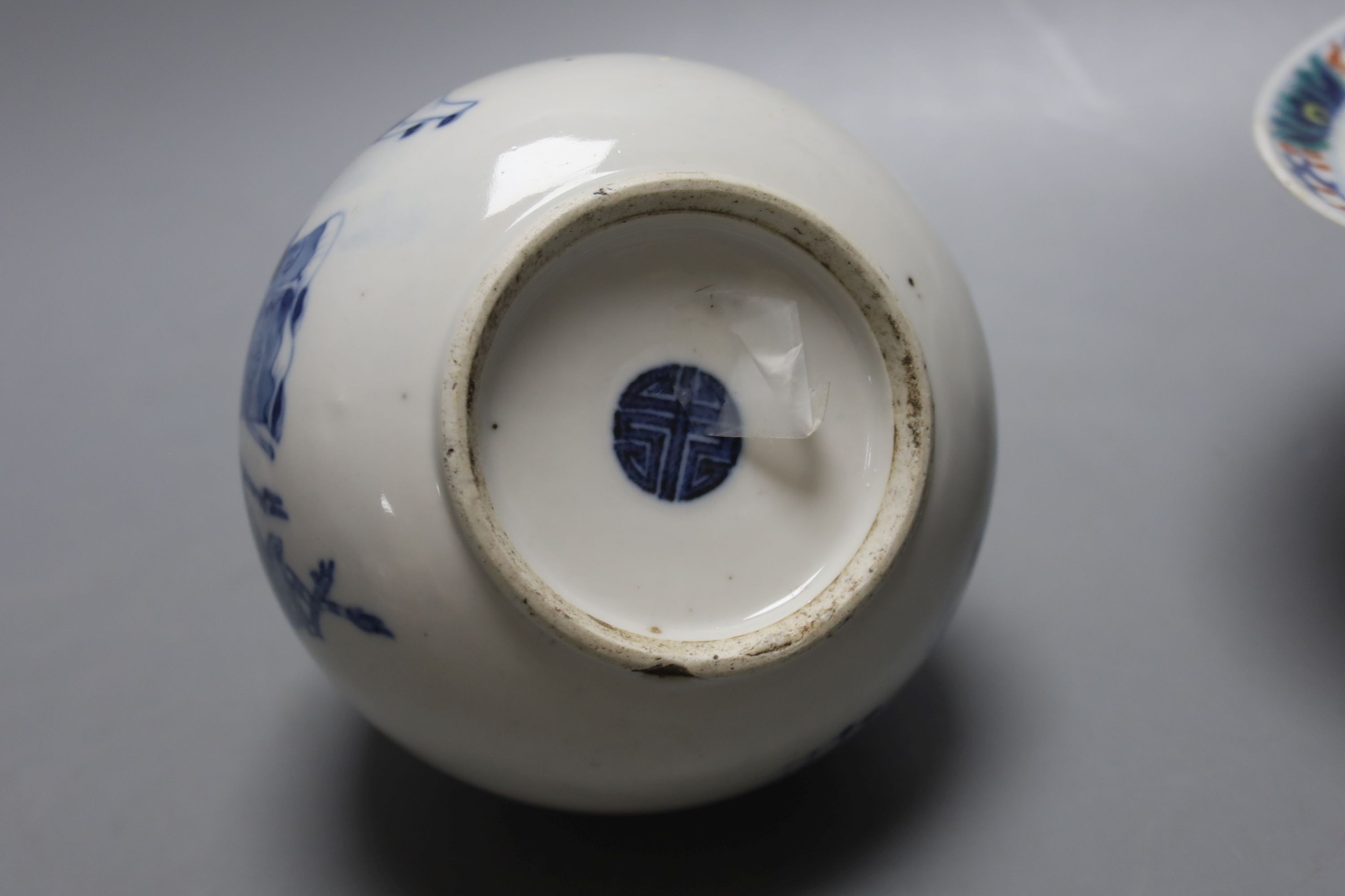 A Chinese blue and white water pipe vessel, a doucai stem dish and a Japanese Imari bowl, 19th century, (3)